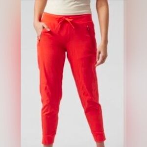 NWOT Athleta Trekkie North Orange Joggers - Recycled Materials, B Corp, UPF